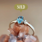 Vintage 9 karaat massief gouden solitaire ring met lichtblauwe topaas