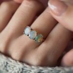 VIntage 9 carat solid gold threestone ring with large oval cut australian opals