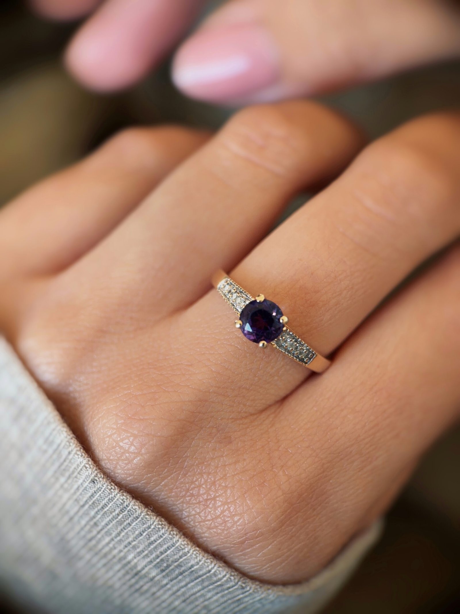 vintage amethyst and diamond solitaire ring in 9k gold worn on hand
