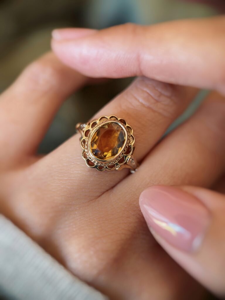 vintage citrine ring in 9k gold with oval cut citrine and decorative setting