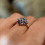 vintage tanzanite cluster ring in 9k gold worn on hand