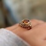 vintage citrine ring in 9k gold with oval cut citrine and decorative setting