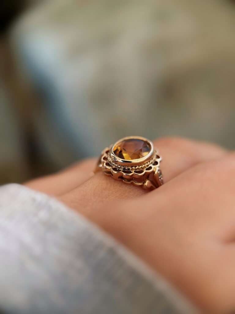 vintage citrine ring in 9k gold with oval cut citrine and decorative setting