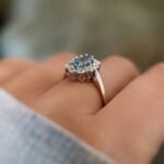 vintage topaz and diamond cluster ring in 9k gold worn on hand