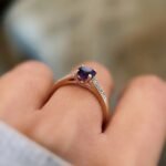 vintage amethyst and diamond solitaire ring in 9k gold worn on hand
