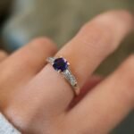 vintage amethyst and diamond solitaire ring in 9k gold worn on hand