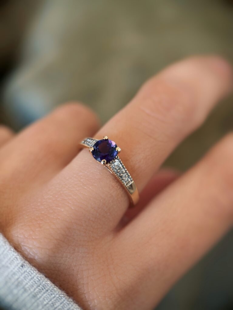 vintage amethyst and diamond solitaire ring in 9k gold worn on hand