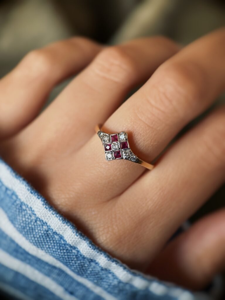 Art deco Ruby diamond cluster ring in 18k gold worn on hand