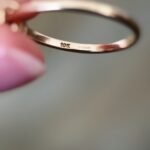Close-up of English hallmarks inside a vintage 10 carat gold ring