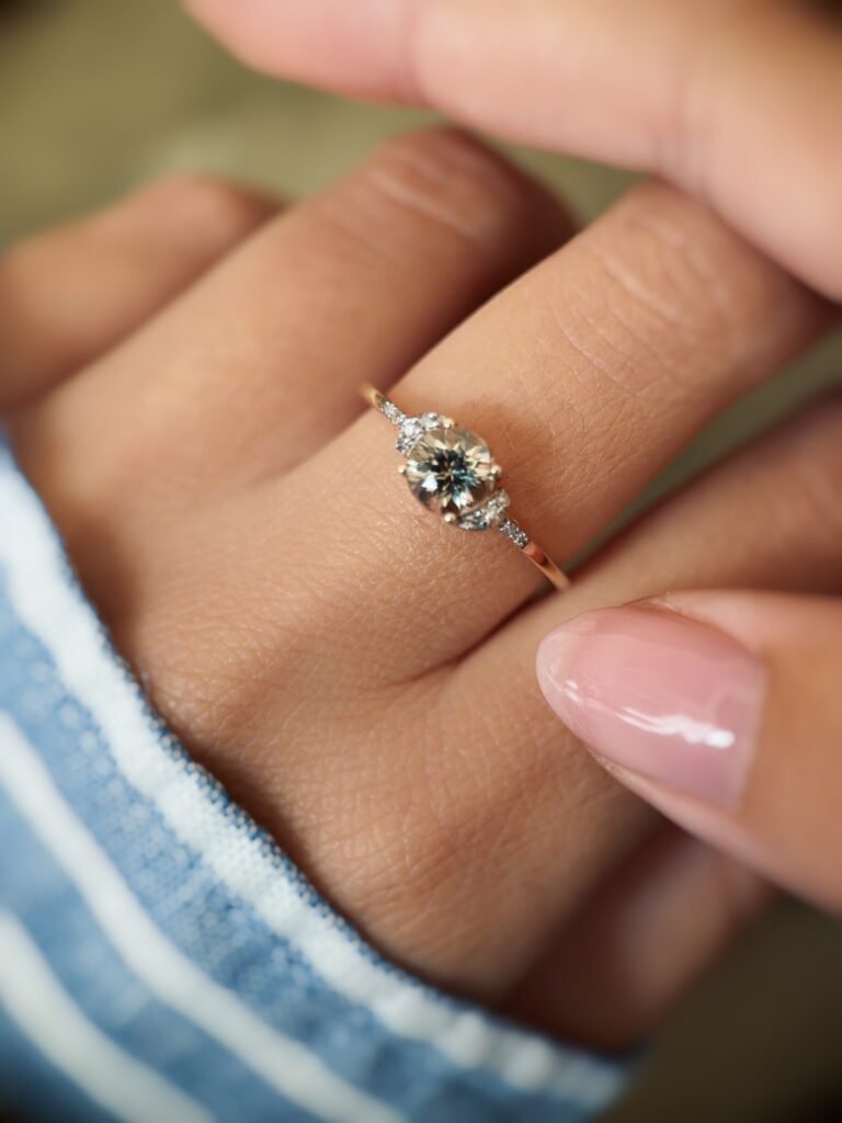 Vintage 10 carat gold quartz and diamond ring worn on a hand