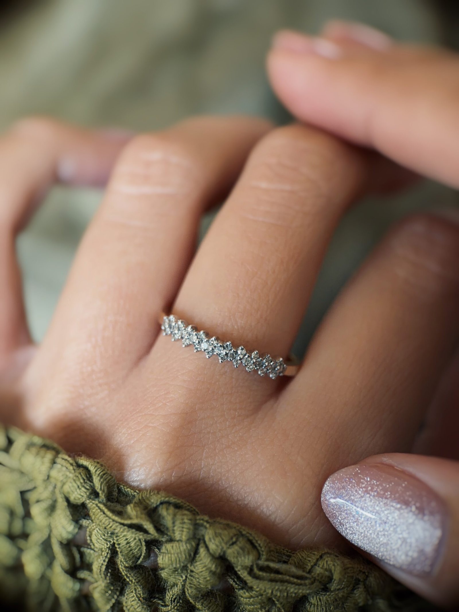 Vintage gold diamond row ring worn on hand