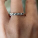 Vintage gold diamond row ring worn on hand
