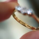 Close-up of English hallmarks inside a antique 18 carat gold ring