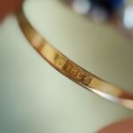 Close-up of English hallmarks inside a antique 18 carat gold ring