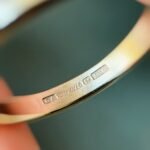 Close-up of English hallmarks inside a vintage 9 carat gold ring