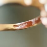Close-up of English hallmarks inside a vintage 9 carat gold ring